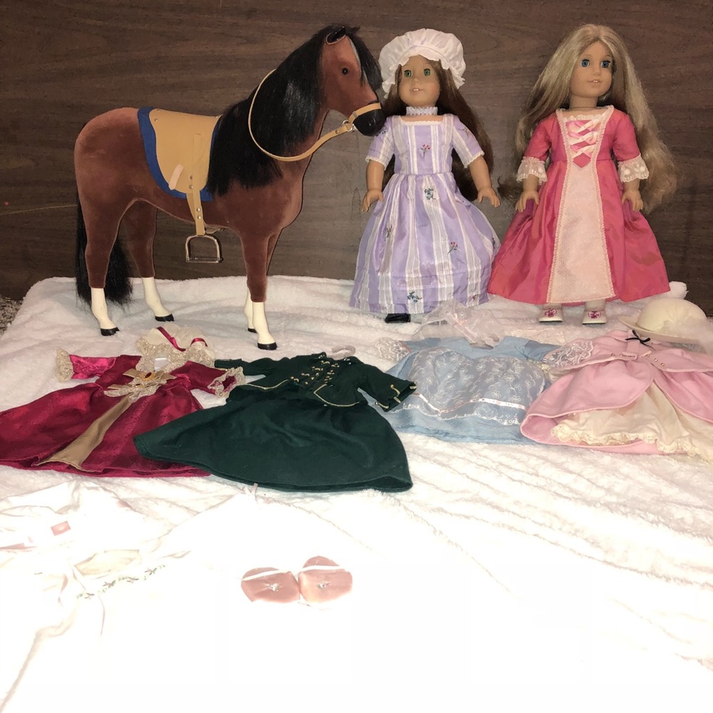 two American girl dolls + horse + 5 outfits